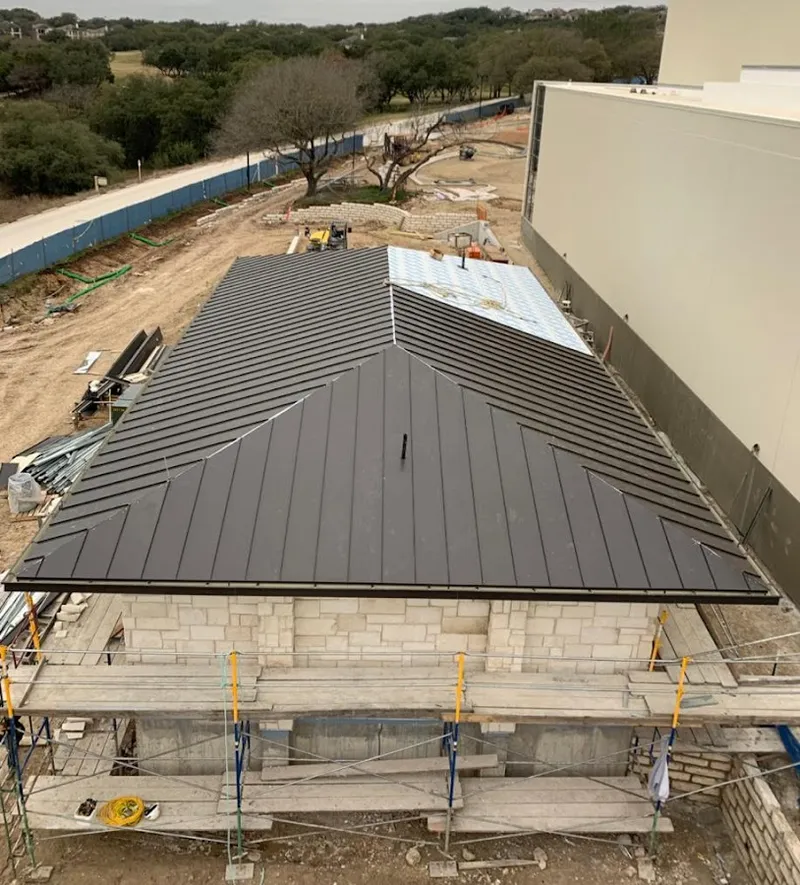 Metal roof new construction with scaffolding in Hanover